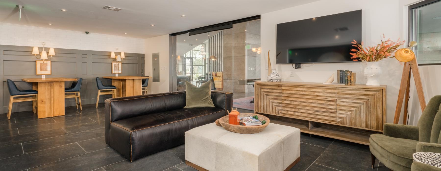 a living room with a couch and a tv