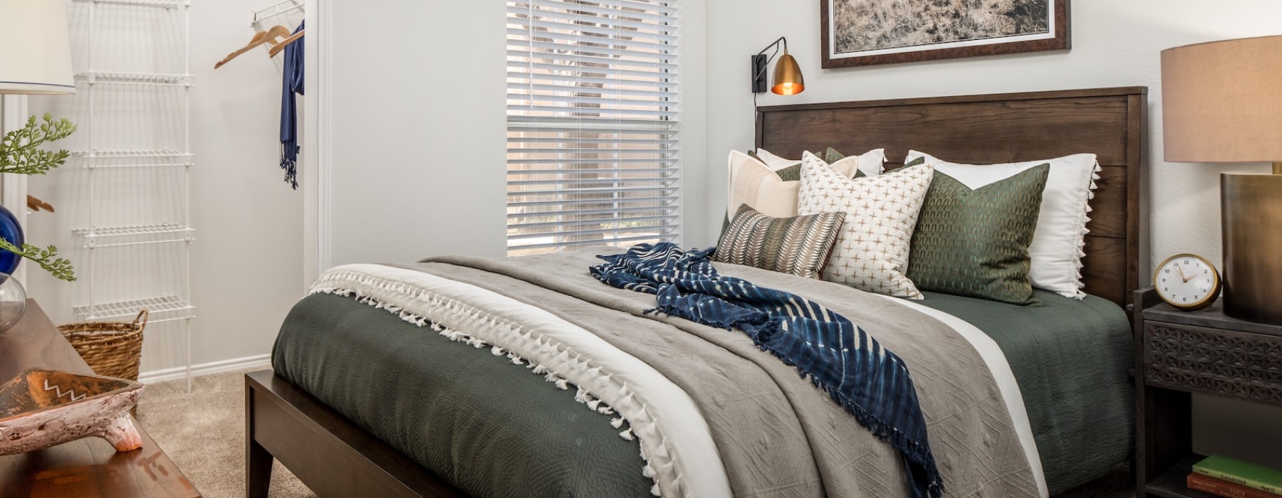 carpeted bedroom with walk-in closet